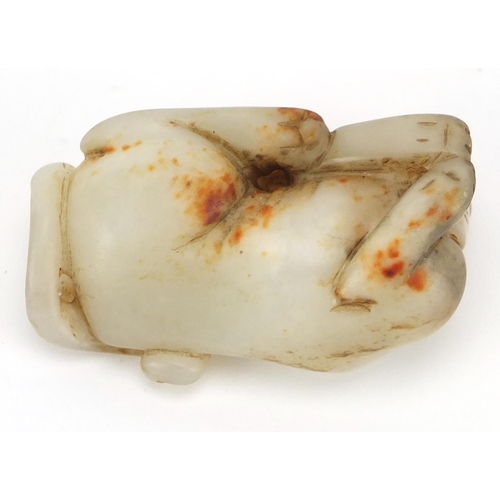 389 - Chinese white and russet jade carving of a lion, 7cm wide