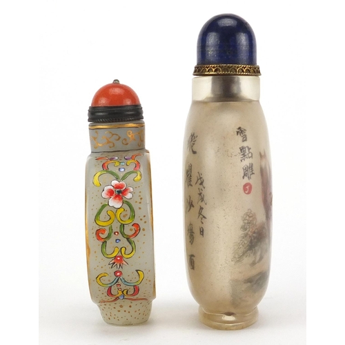 394 - Two Chinese glass snuff bottles with stoppers, one enamelled with butterflies amongst flowers, the o... 