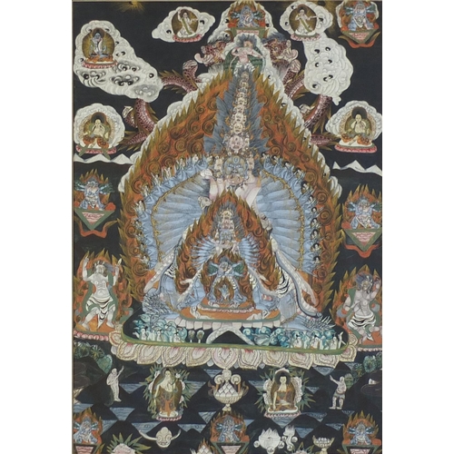 111 - Nepalese thangka hand painted with deities and mythical animals, mounted and framed, 68.5cm x 46.5cm