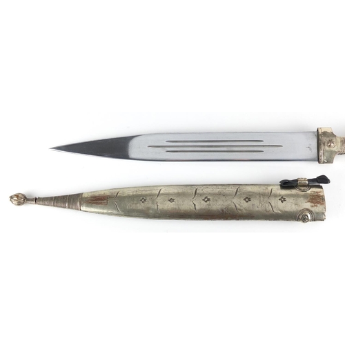 426 - Caucasian Kindjal dagger with silver coloured metal handle and scabbard, each having foliate motifs ... 