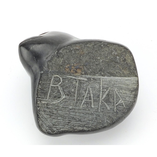 473 - Large Inuit stone carving of a young seal, incised BTAKA to the base, 13cm H x 15cm W x 17cm D