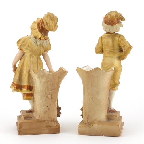 233 - Pair of Austrian figural porcelain spill vases by Ernst Wahliss of young children, each with factory... 