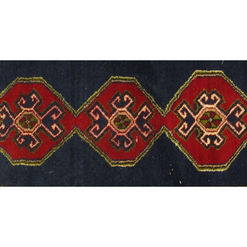 91 - Two Turkish Yastik rugs, each approximately 100cm x 48cm