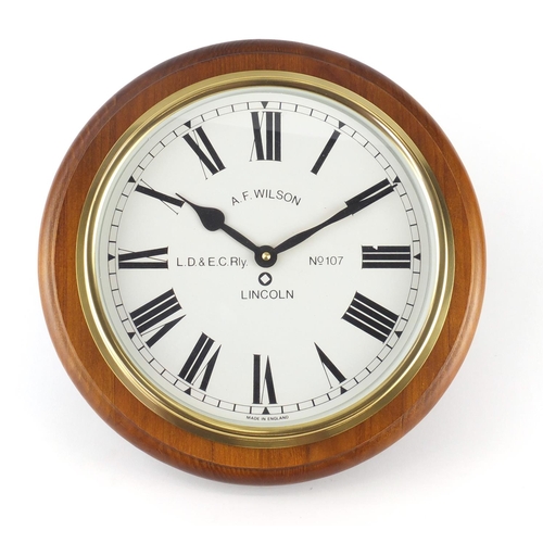 289 - Modern cherry wood wall clock by A F Wilson of Lincoln with Roman numerals, 32cm in diameter