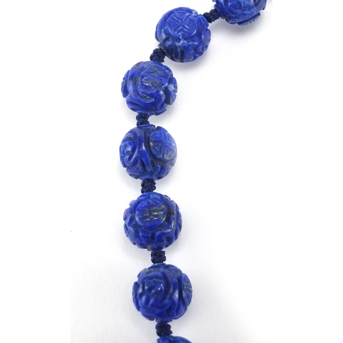 328 - Chinese carved lapis lazuli bead necklace, 46cm in length, approximate weight 77.6g
