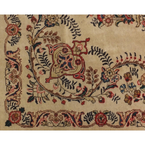 2015 - Rectangular Persian Tabriz carpet, the central field having foliate motifs onto an ivory ground with... 