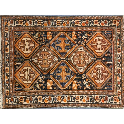 2056 - Rectangular North West Persian Yalameg rug, the central field having a flower and bird design onto a... 