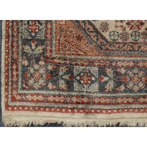 2081 - Chinese Persian design silk rug, the ivory central field having a flower head design within correspo... 