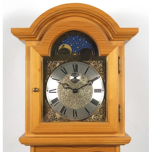 2084 - German pine eight day wall clock by Kieninger, chimining on five rods, with moon phase dial, 82cm hi... 