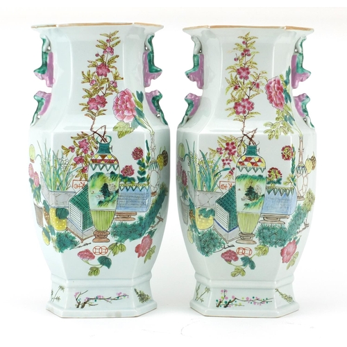 2128 - Large pair of Chinese porcelain vases with twin handles and hexagonal bodies, each hand painted in t... 