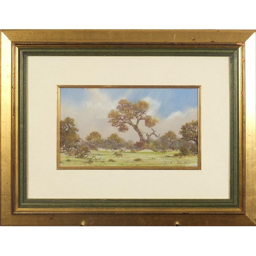 2192 - David Johnson - Water buffalo beside water and warthog in a landscape, two pastels, mounted and fram... 