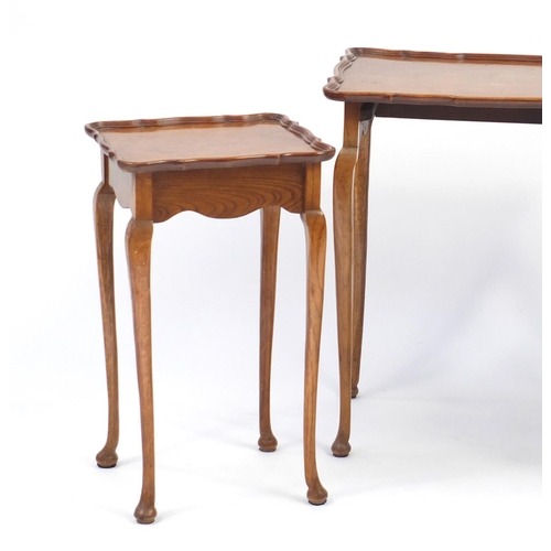 28 - Nest of three birds eye maple and oak occasional tables, the largest 60cm H x 54cm W x 41cm D