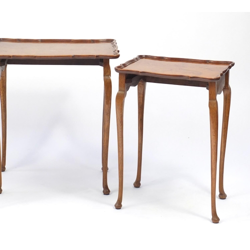 28 - Nest of three birds eye maple and oak occasional tables, the largest 60cm H x 54cm W x 41cm D