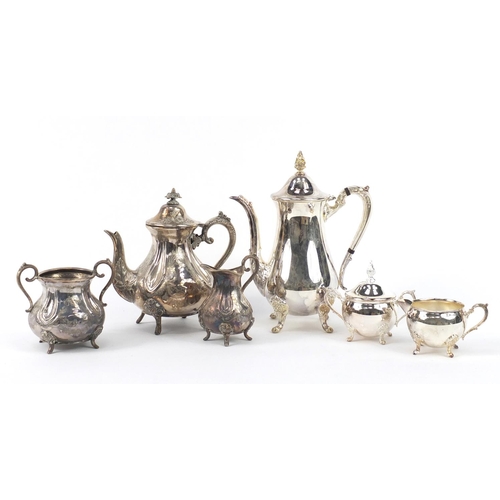 213 - Two three piece silver plated tea sets