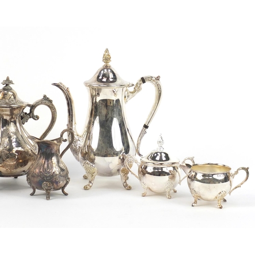 213 - Two three piece silver plated tea sets
