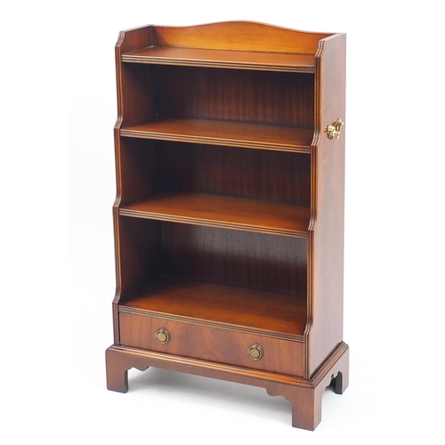 2059 - Good reproduction mahogany waterfall bookcase with base drawer and brass carrying handles, 104cm H x... 