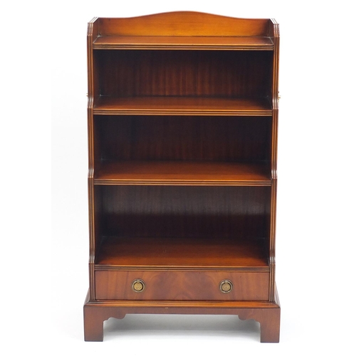 2059 - Good reproduction mahogany waterfall bookcase with base drawer and brass carrying handles, 104cm H x... 