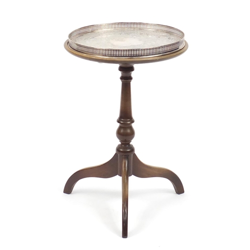 2028 - Mahogany tripod wine table with chased silver plated removable tray, 58cm H, the tray 36cm in diamet... 