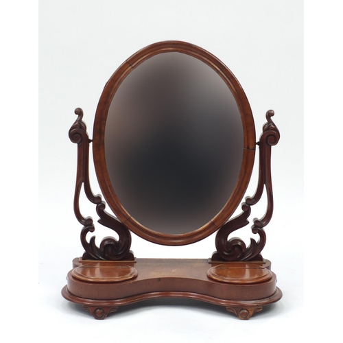 14 - Victorian walnut swing mirror with two hinged compartments, 64cm high