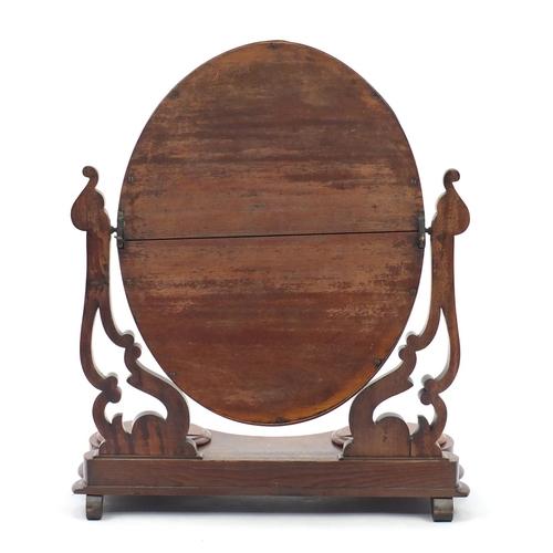 14 - Victorian walnut swing mirror with two hinged compartments, 64cm high