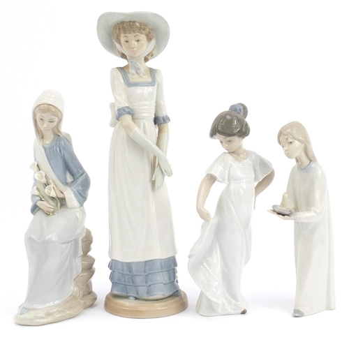 494 - Four Lladro and Nao figurines, the largest 72cm high