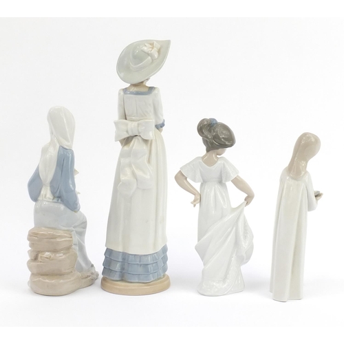 494 - Four Lladro and Nao figurines, the largest 72cm high