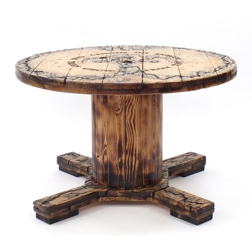 2044 - Jack Daniels style wooden table on turned column, 57cm high x 90cm in diameter