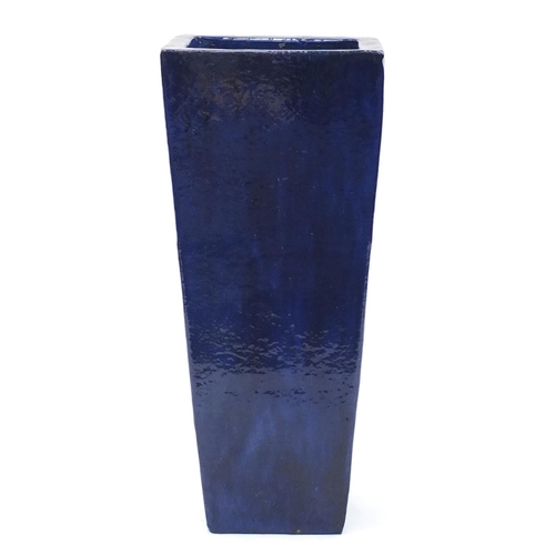 2073 - Tall blue glazed planter of tapering form, 90cm high x 40cm sq