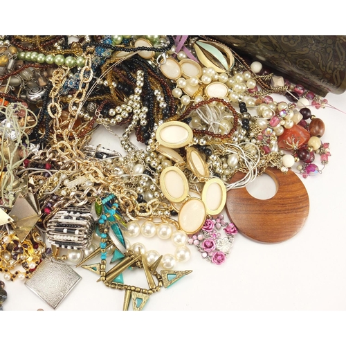 353 - Costume jewellery including brooches, necklaces and bracelets