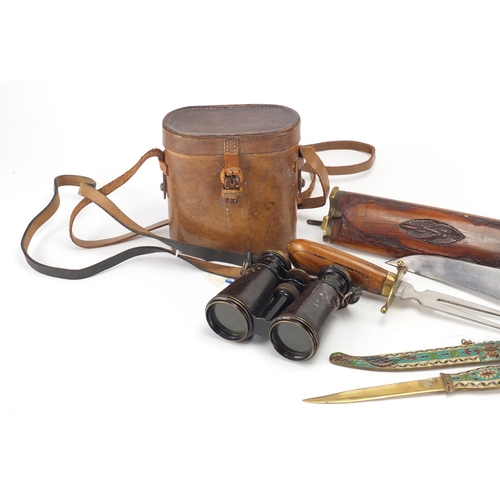 571 - Two wooden carving sets, an enamelled knife and pair of binoculars with leather case