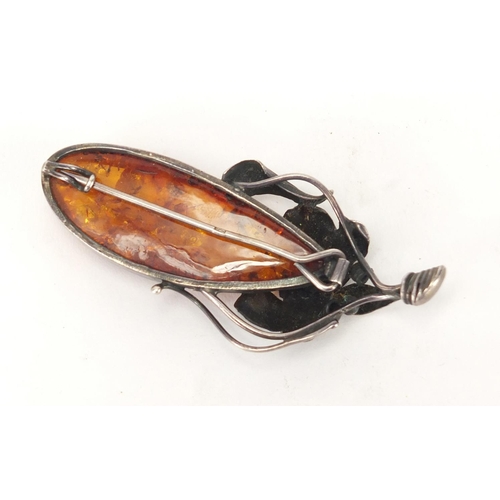 319 - Large silver and natural amber brooch, 7cm in length