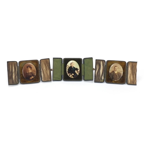 409 - Three photographic portrait miniatures, each housed in a case marked USA Studios
