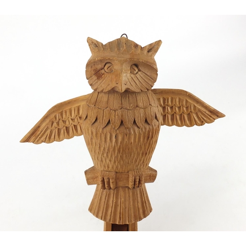 485 - Novelty carved wood owl coat hanger with moving wings, 27cm in length
