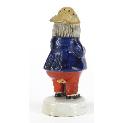 496 - Staffordshire pottery caster, 14.5cm high