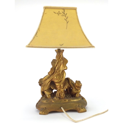 174 - Gilt putti table lamp, 43cm high