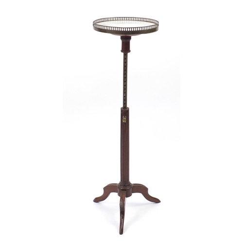 3 - Mahogany telescopic wine table with brass gallery and marble top, 78cm high x 33cm in diameter