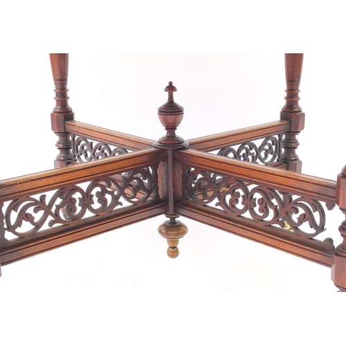 55 - Edwardian octagonal mahogany centre table with pierced stretchers, 72cm H x 89cm W x 89cm D