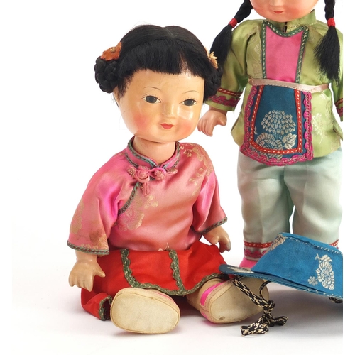 205 - Two vintage Japanese lacquered dolls, 22cm high
