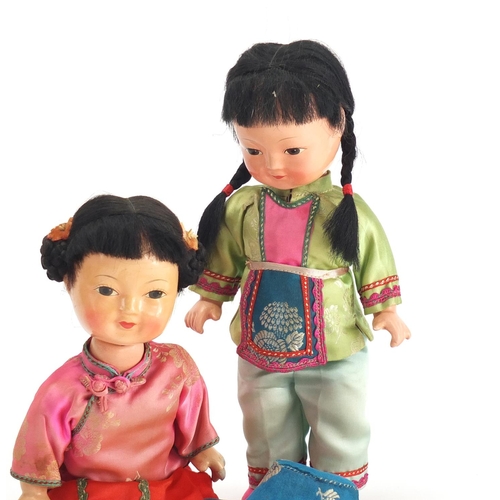 205 - Two vintage Japanese lacquered dolls, 22cm high