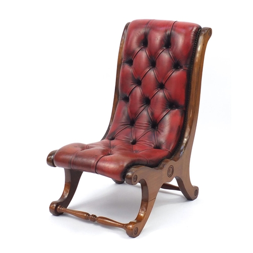 2036 - Mahogany framed and oxblood leather button back sleigh chair, 78cm high