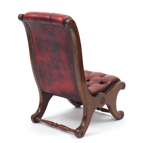 2036 - Mahogany framed and oxblood leather button back sleigh chair, 78cm high