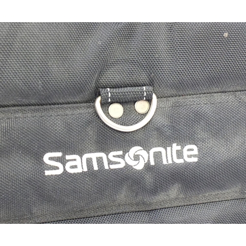 626 - Samsonite golf bag with wheels