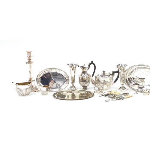 264 - Silver plate including a three branch candelabra, three pierce tea set and an entrée dish with cover