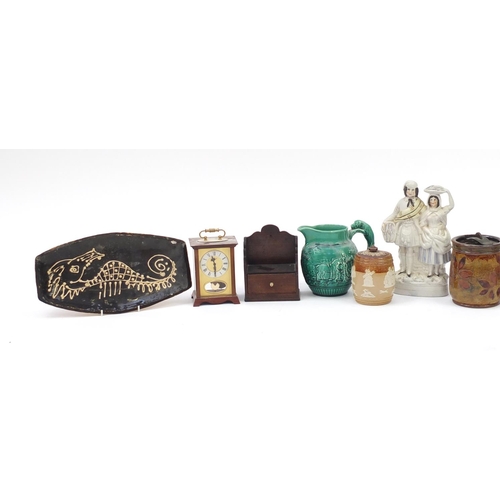 254 - Sundry items including a Royal Doulton stoneware tobacco jar and cover, Wedgwood Majolica jug, mante... 