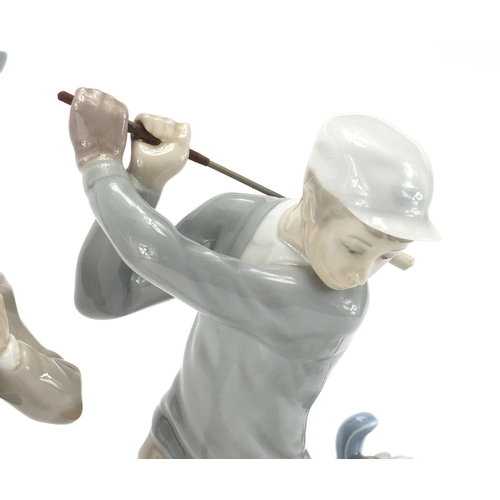 482 - Two Lladro golf figures, the largest 30cm high
