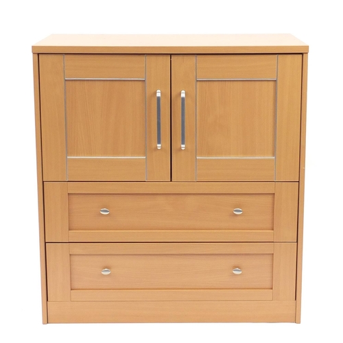 32 - Light wood side cabinet with a pair of cupboard doors enclosing a shelf above two drawers, 100cm H x... 