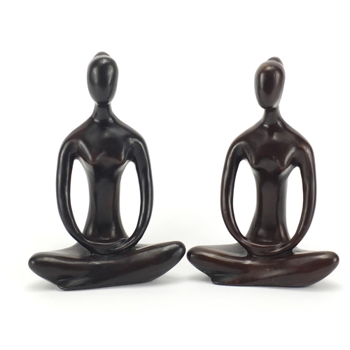443 - Two bronzed figures of ladies seated in the lotus position, the largest 22cm high