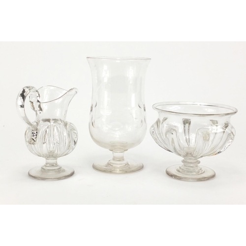 206 - Glass jug and two glasse vases, the largest 18cm high