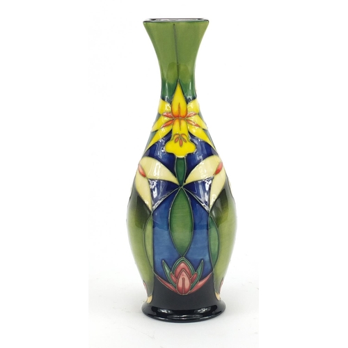 2095 - Moorcroft pottery vase with box hand painted with daffodils, 21cm high