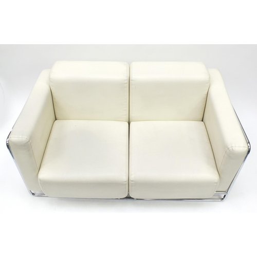 2019 - Contemporary cream faux leather and chrome framed two seater settee, 150cm wide